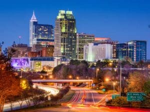 Wide-angle view of central buildings in Raleigh, NC, to illustrate cybersecurity risks facing businesses there.