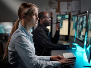security personnel working at night to illustrate 24/7 support from managed services