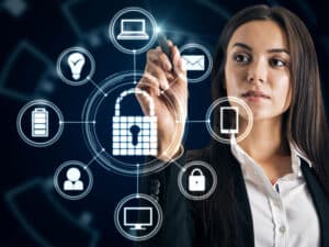 woman indicating a range of cybersecurity services on a graphic