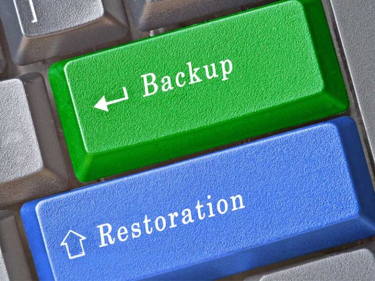 two computer keys labelled backup and restoration respectively to illustrate backup and disaster recovery in Florence SC